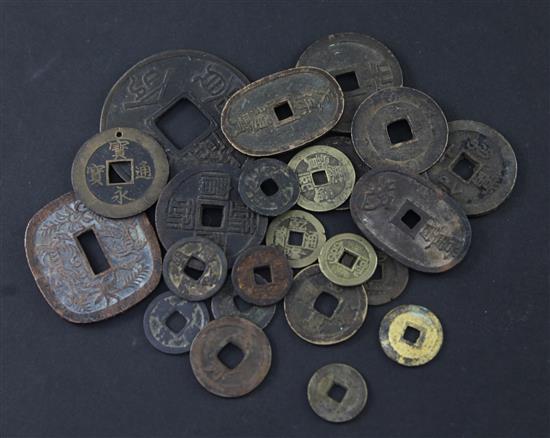 A collection of Japanese mon and half-shu coins and Chinese bronze and copper coins, 15th-19th century (23)